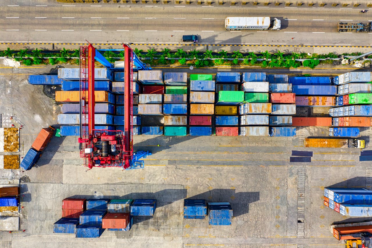 Services Colorful cargo containers organized at a shipping yard in North Jakarta, Indonesia.